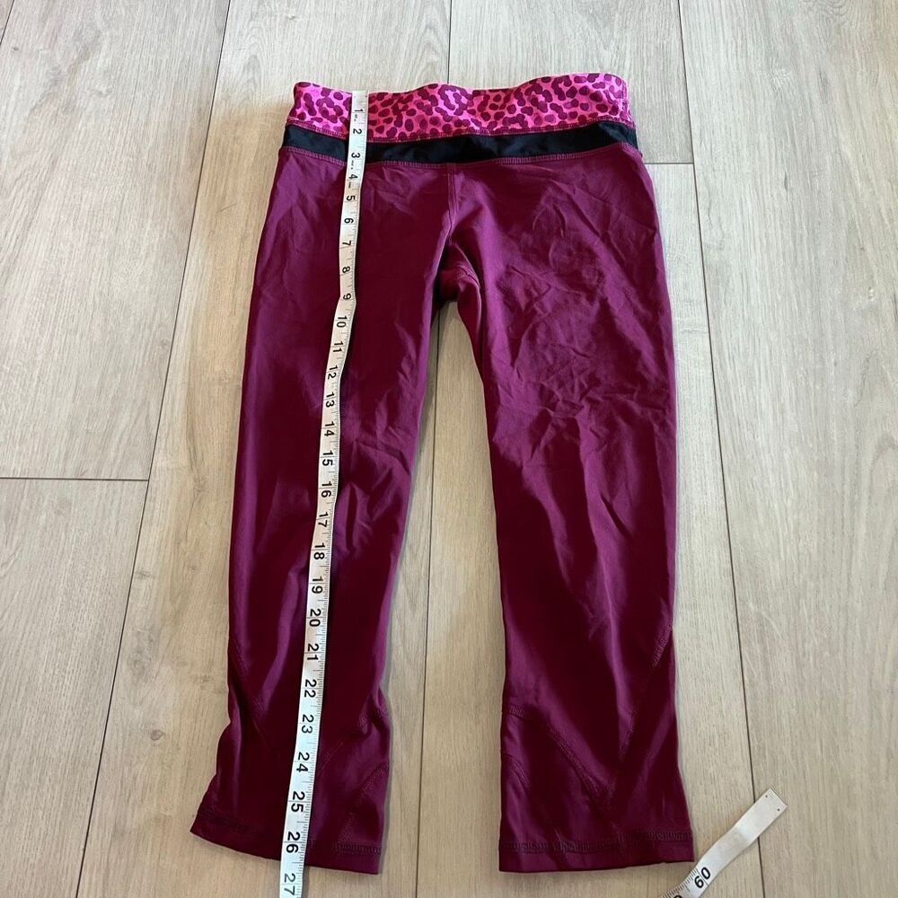lululemon athletica Wine Red Cropped Leggings with Pink Leopard Waistband - Picture 2 of 9